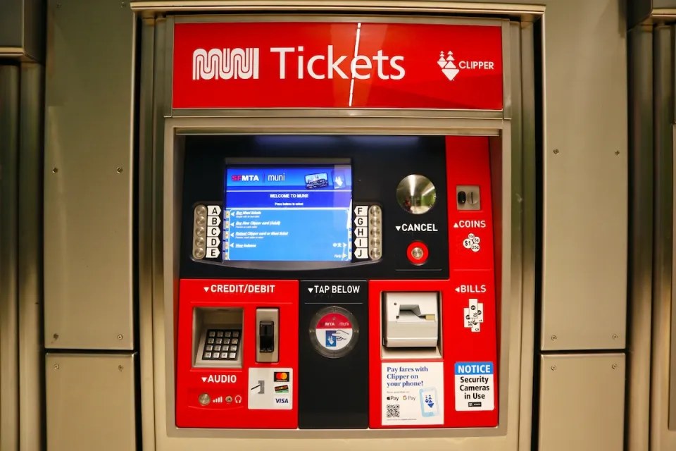 Red SF Muni ticketing machine.